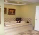 Ceramic tile around tub and tray ceiling