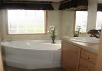 Corner tub with block window, manufactured housing, manufactured homes of pa