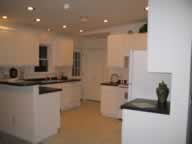 white cabinets, recessed ceiling lights