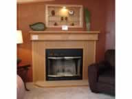 Wood fireplace surround and mantel